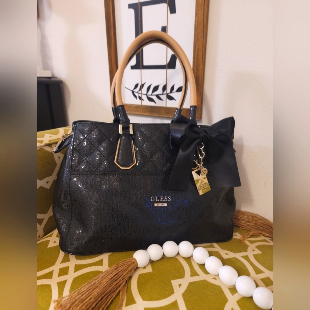 Guess Shiny Black Handbag with Tan Handles 14 in L 91/2 H 7 inch shoulder drop.
